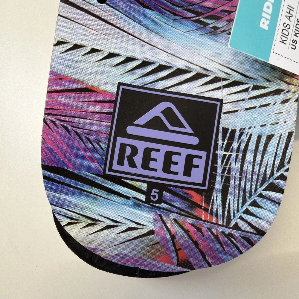 NWT Reef Kid's AHI‎ Flip Flop Size 5 Palm Fronds Tropical Purple Pink Blue Logo